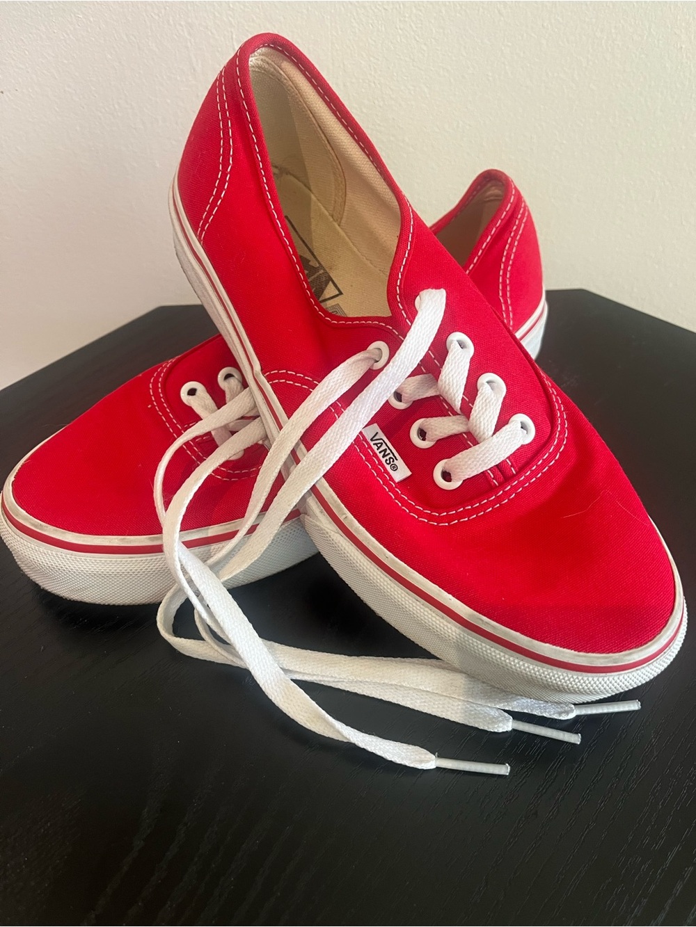Red Low-Top Canvas Vans Sneakers